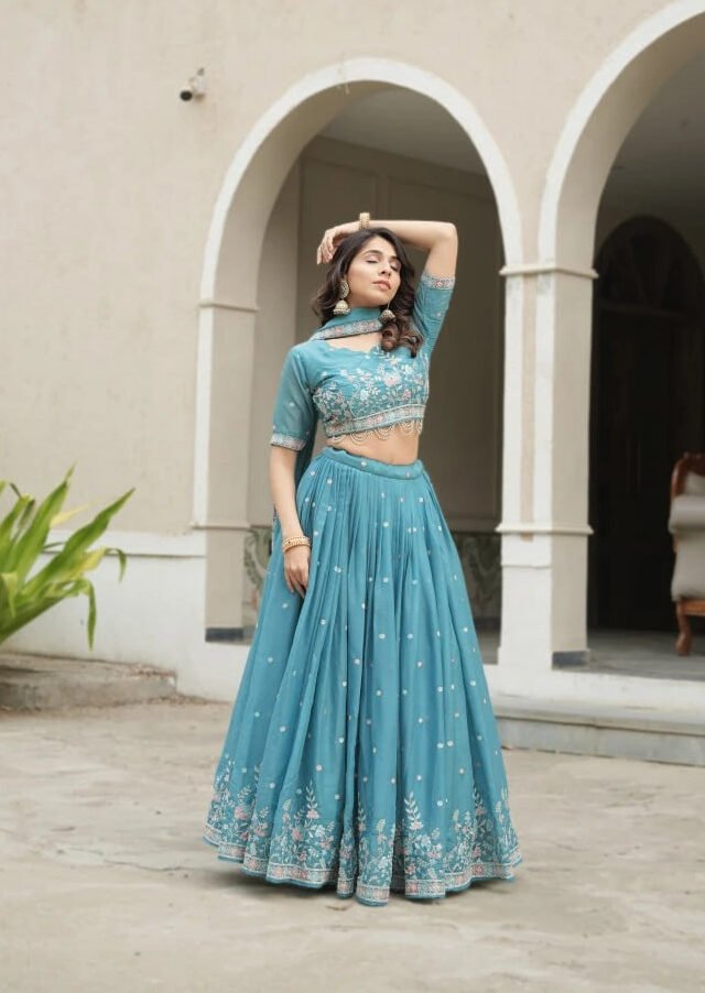 Fabulous Teal Blue Star Georgette Lehenga Choli With Pearl Lace