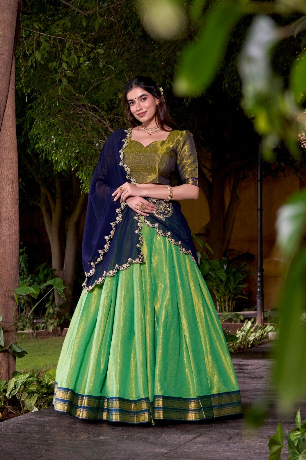 Trendy Pista Kanchipuram Lehenga Choli With Zari Weaving Work