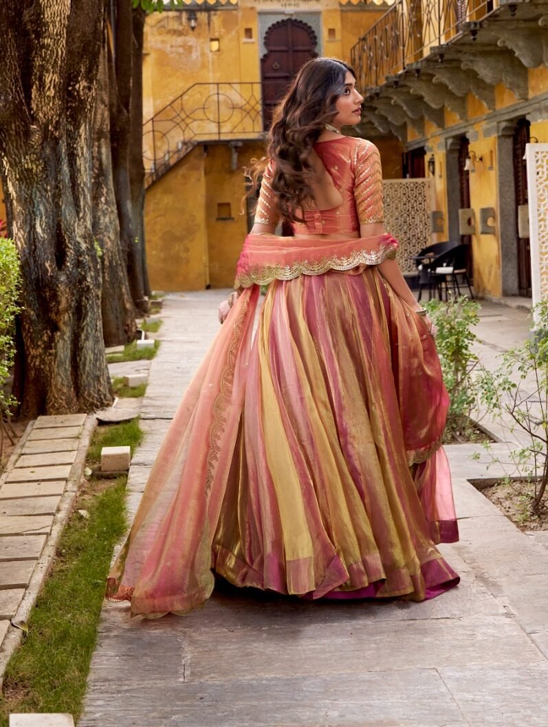 Gorgeous Rose Gold Carika Silk Lehenga Choli With Embroidery Work