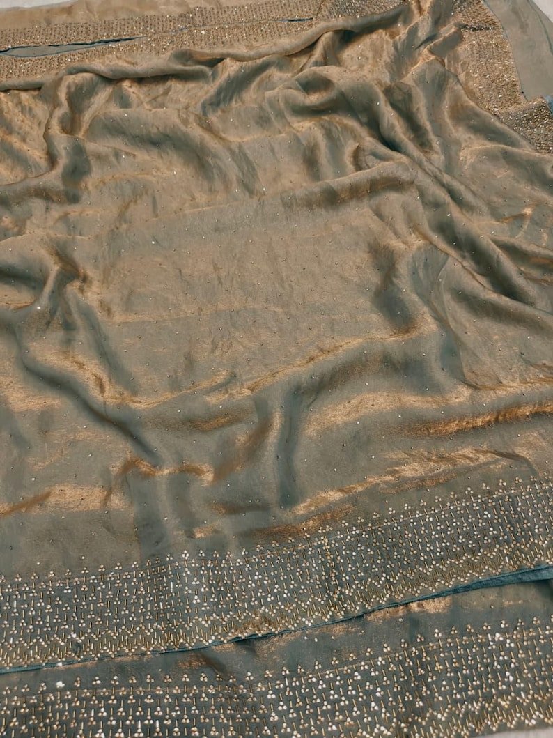 Pista Green Soft Space Silk Saree With Dual Shaded Fabric
