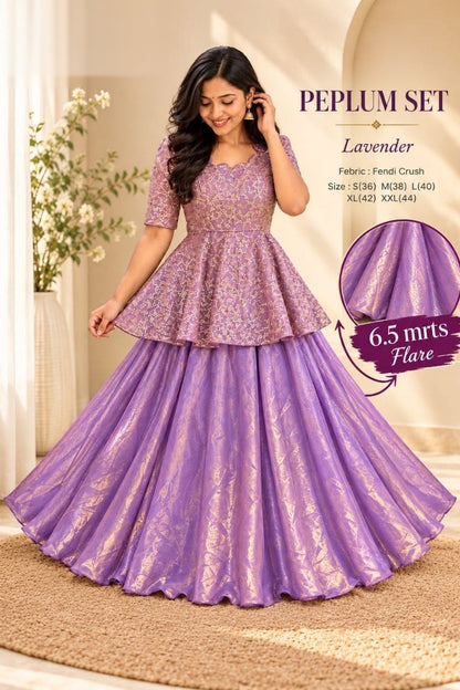 Exquisite two-piece ensemble featuring a classic peplum top paired with a gracefully flowing skirt