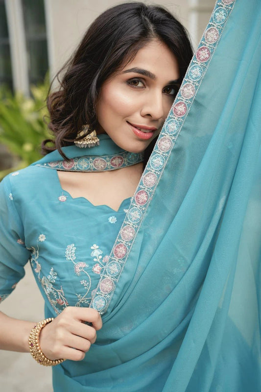 Fabulous Teal Blue Star Georgette Lehenga Choli With Pearl Lace
