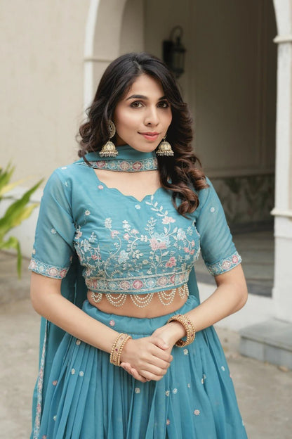 Fabulous Teal Blue Star Georgette Lehenga Choli With Pearl Lace