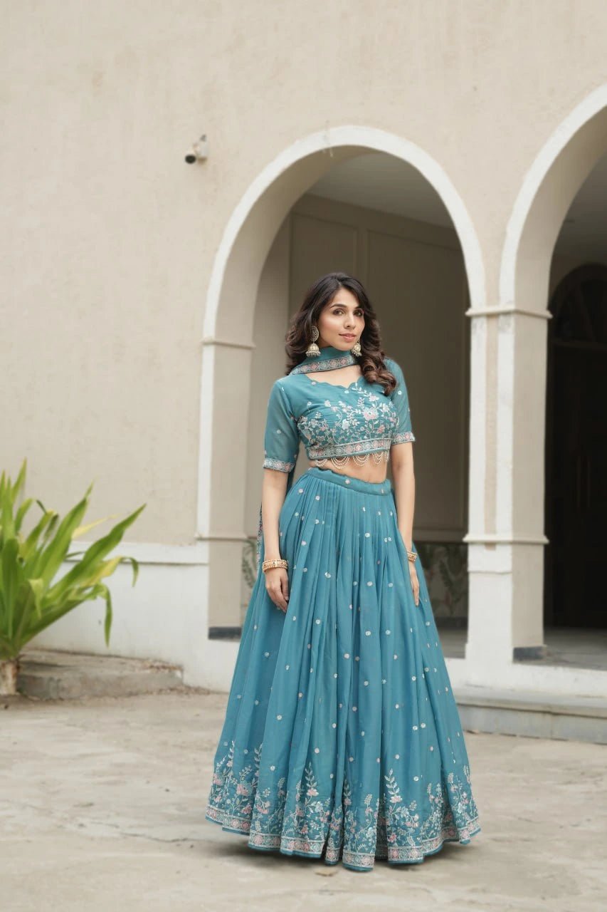 Fabulous Teal Blue Star Georgette Lehenga Choli With Pearl Lace