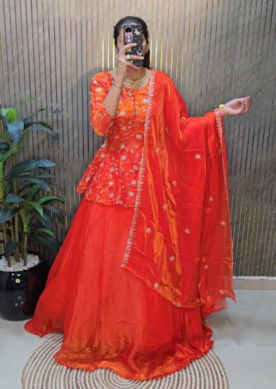 Outstanding Orange Peplum Lehenga Choli With Maggam Work