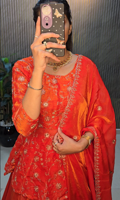 Outstanding Orange Peplum Lehenga Choli With Maggam Work