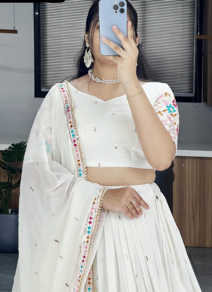 Fabulous White Faux Georgette Embroidered Lehenga Choli