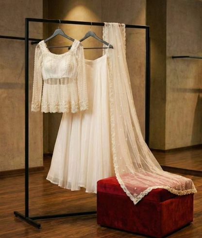 White Silk Lehenga Choli With Flowy Silhouette