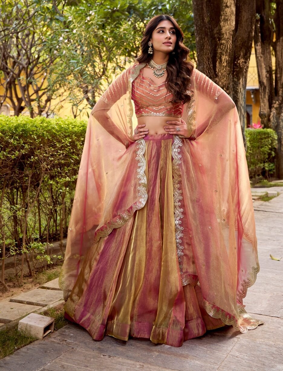 Gorgeous Rose Gold Carika Silk Lehenga Choli With Embroidery Work