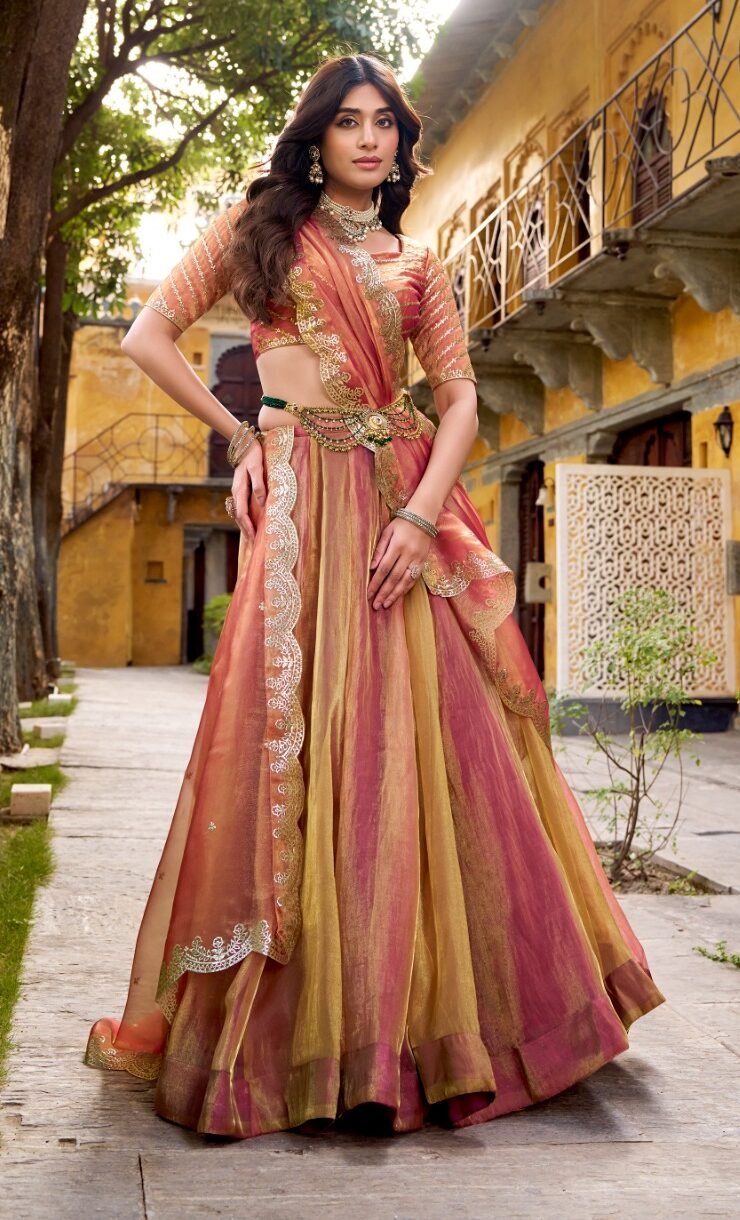 Gorgeous Rose Gold Carika Silk Lehenga Choli With Embroidery Work