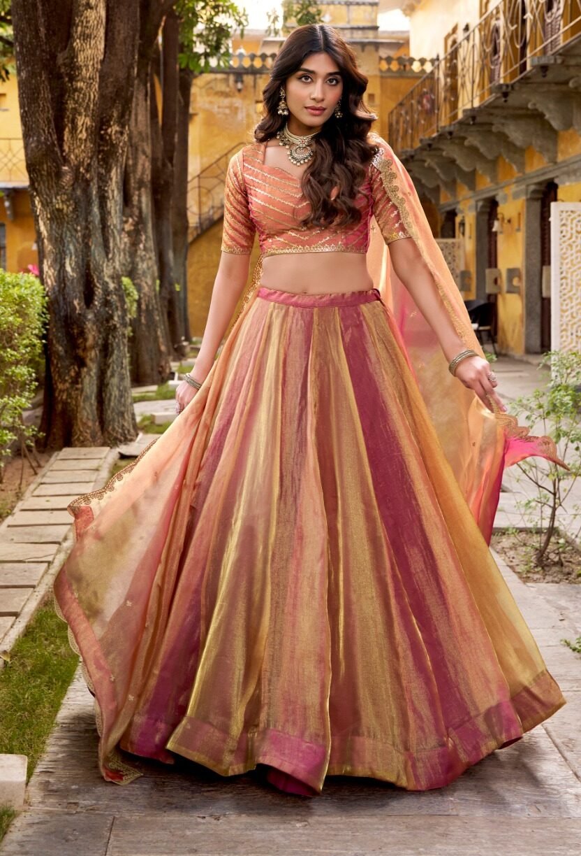Gorgeous Rose Gold Carika Silk Lehenga Choli With Embroidery Work