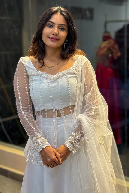 White Silk Lehenga Choli With Flowy Silhouette