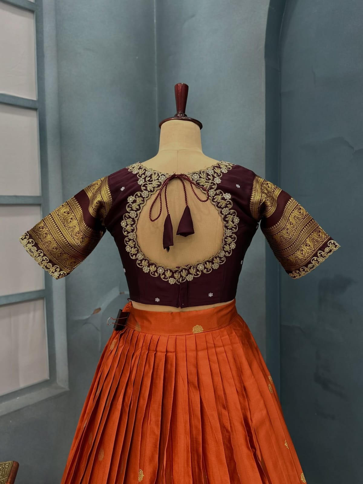 Exclusive Orange Kanjivaram Silk Lehenga With Maggam Work On Blouse