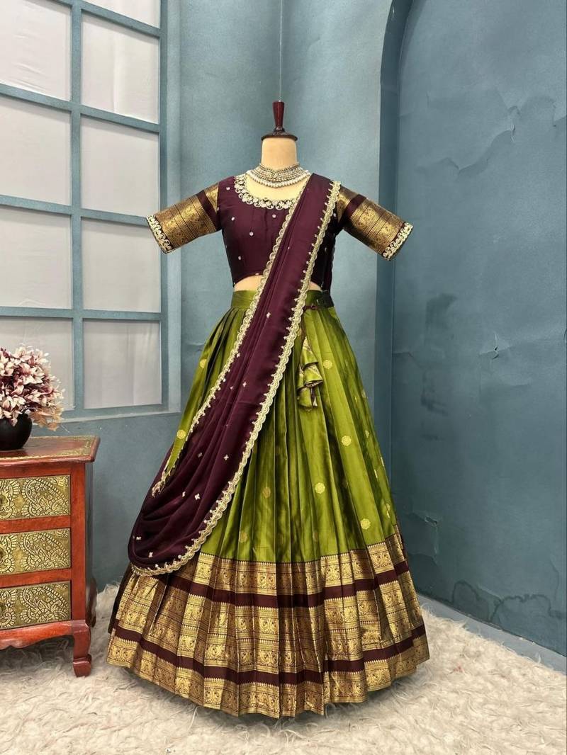 Trending Olive Green Kanjivaram Silk Lehenga With Designer Maggam Work Blouse