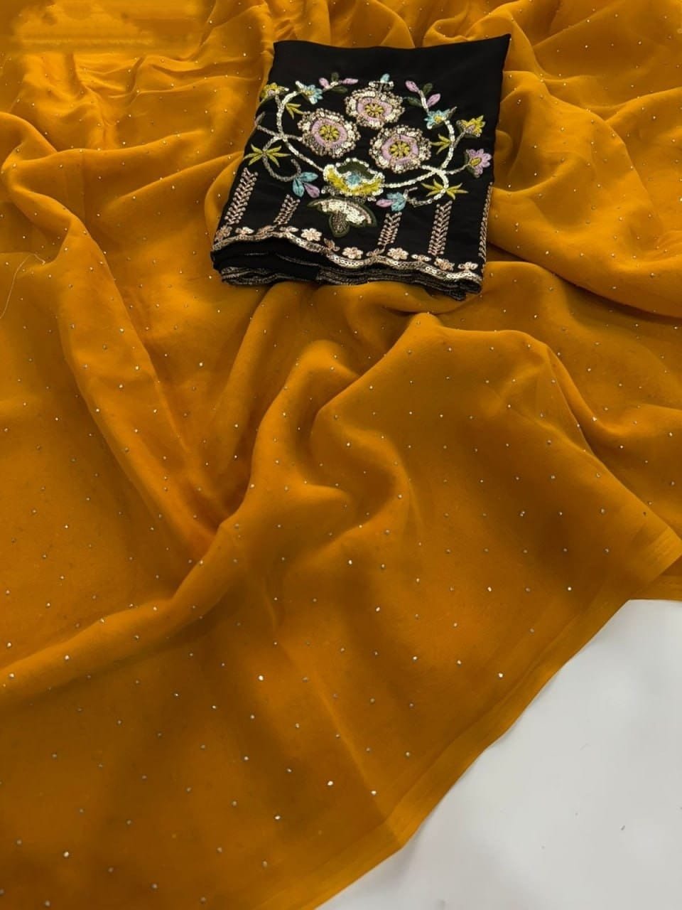 9f354b3b-c5e3-4208-9331-355897929a48 Georgette sarees