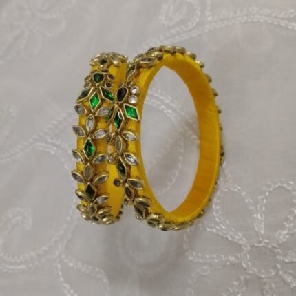 Yellow Silk Thread Bangles With Green Diamond Shape