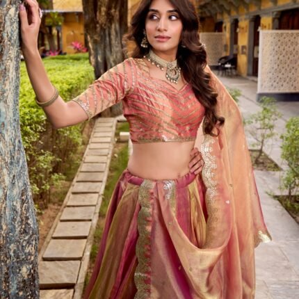 Gorgeous Rose Gold Carika Silk Lehenga Choli With Embroidery Work